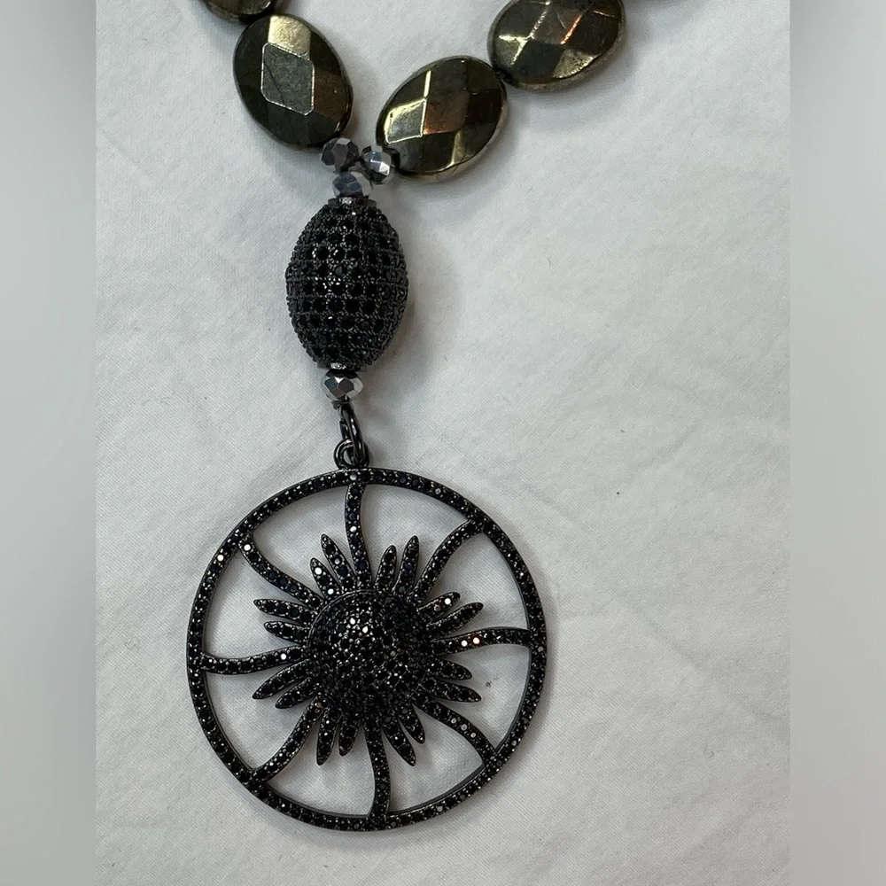 Unique Sunburst Pendent necklace Black and Silver tone‎ beads